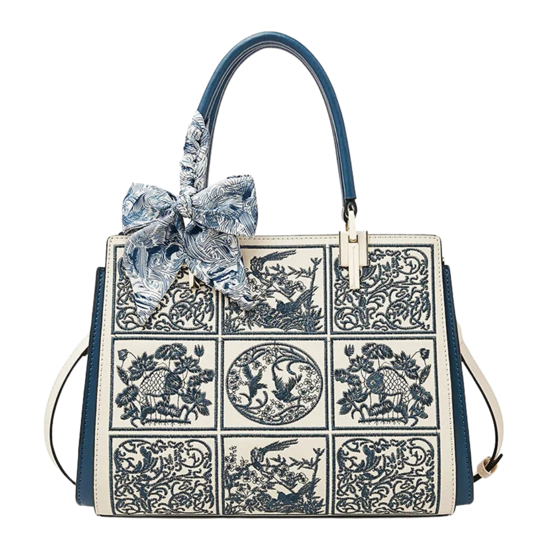 sylvia | unique crossbody with embroidery and bow detail