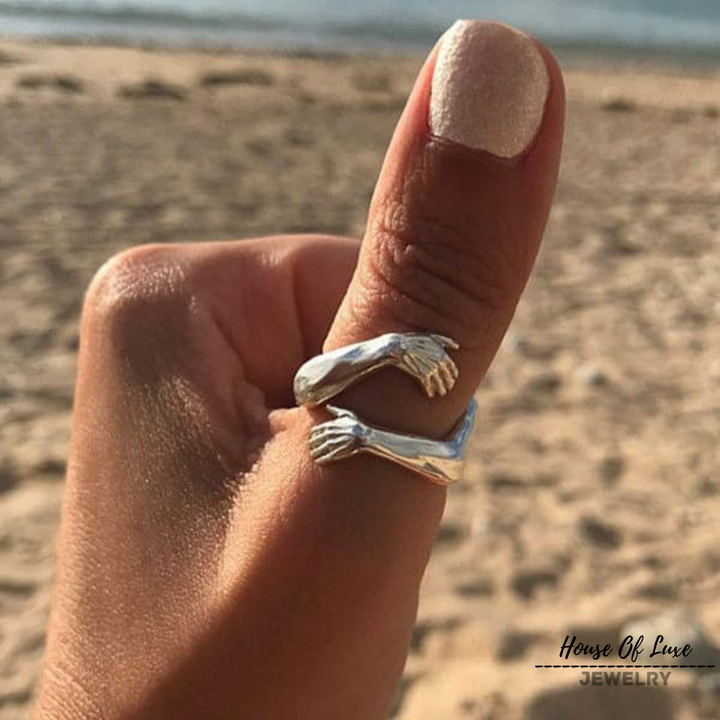 ADJUSTABLE SILVER HUG RING