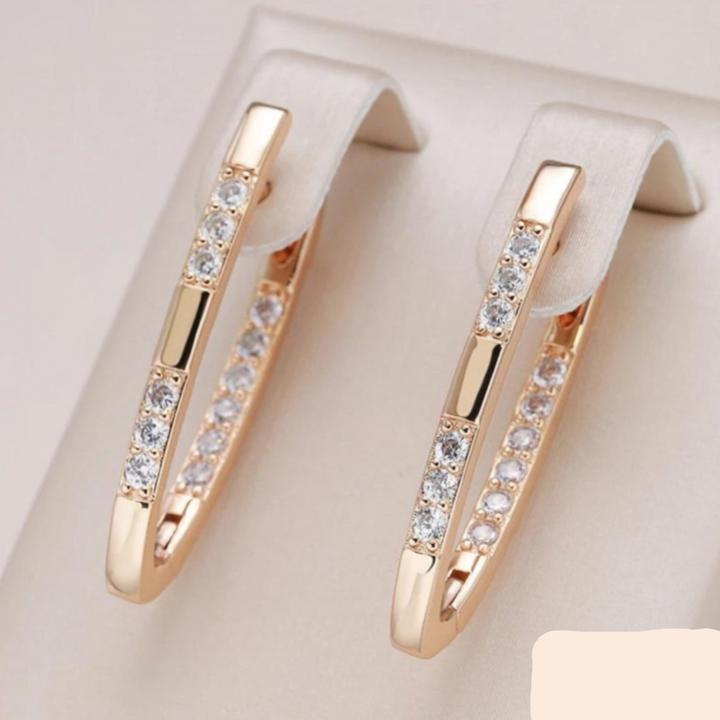 ELEGANT ZIRCONIA EARRINGS IN GOLD