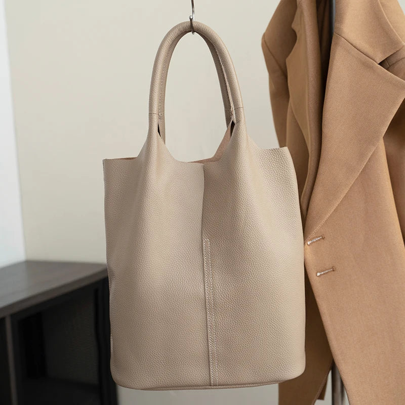 saga | ight blue bucket bag in luxury leather look