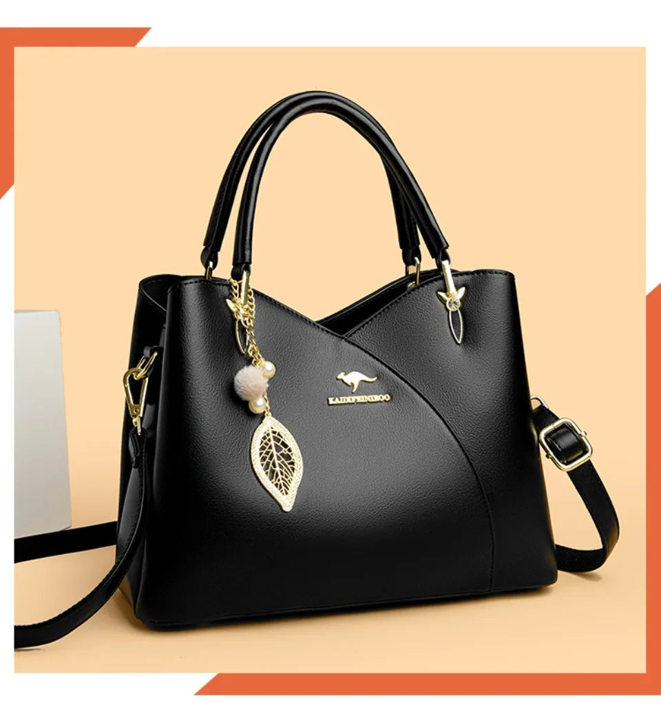 felina | black shoulder bag with elegant pendant