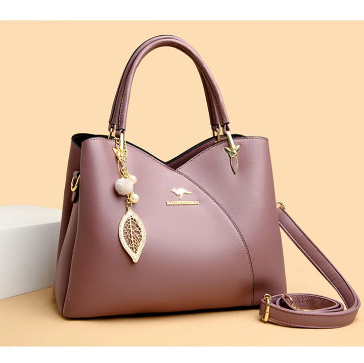 felina | black shoulder bag with elegant pendant