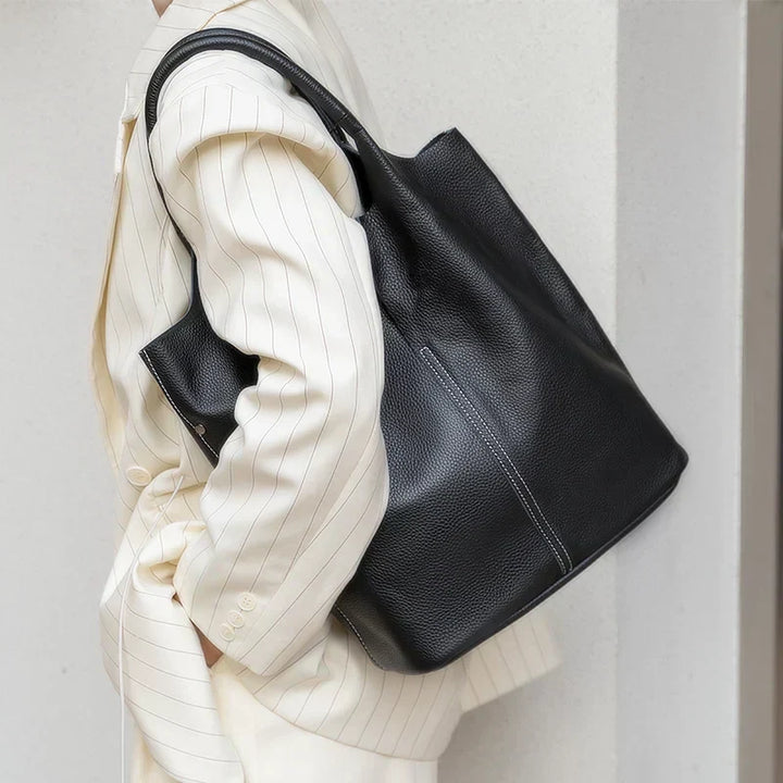 saga | ight blue bucket bag in luxury leather look