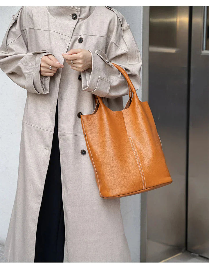 saga | ight blue bucket bag in luxury leather look