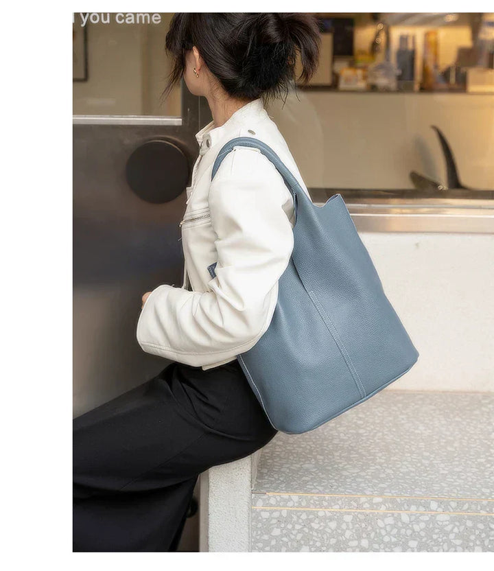 saga | ight blue bucket bag in luxury leather look