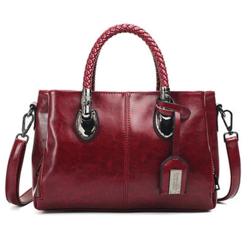 Pia | Elegant leather bag with braided handles