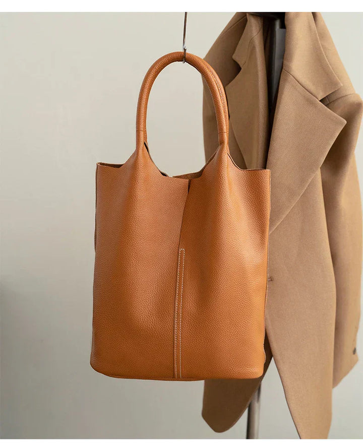 saga | ight blue bucket bag in luxury leather look