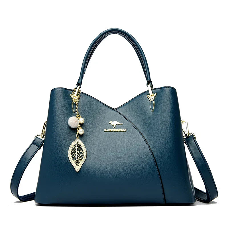 felina | black shoulder bag with elegant pendant