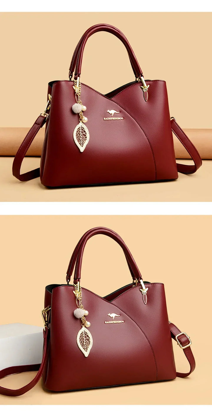 felina | black shoulder bag with elegant pendant
