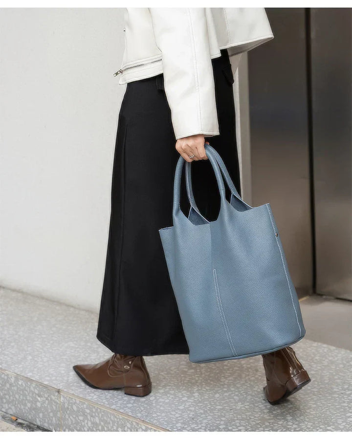 saga | ight blue bucket bag in luxury leather look
