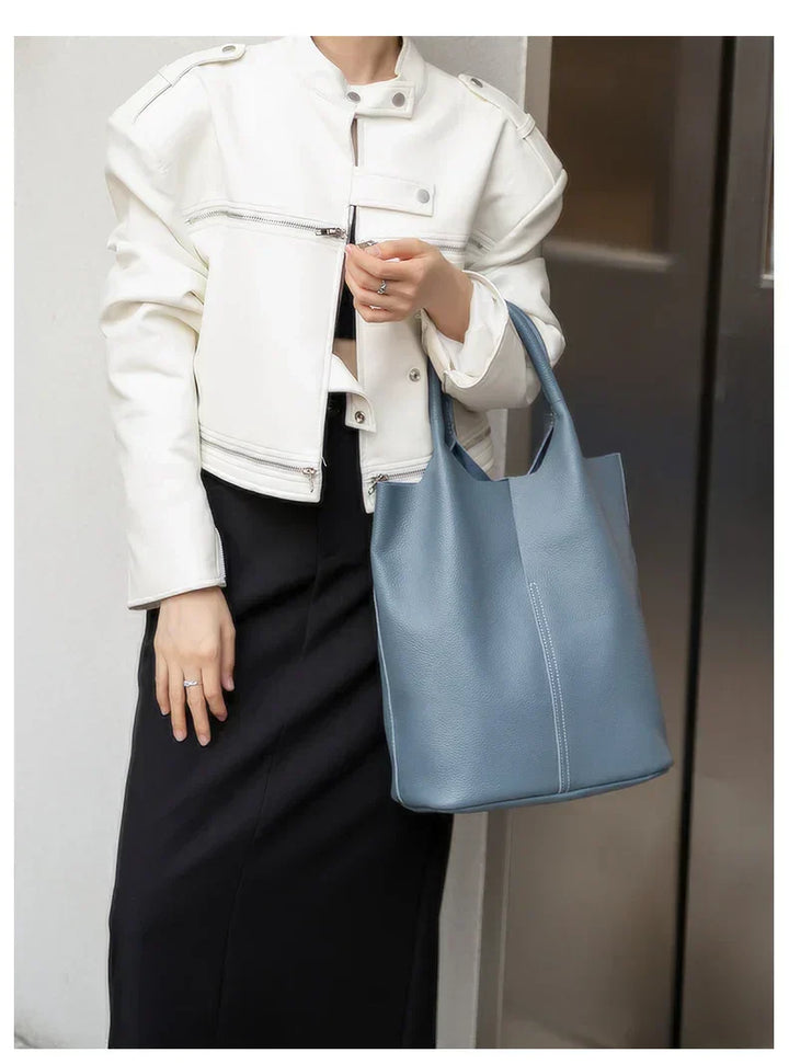 saga | ight blue bucket bag in luxury leather look