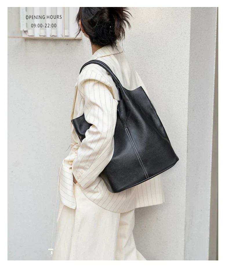 saga | ight blue bucket bag in luxury leather look