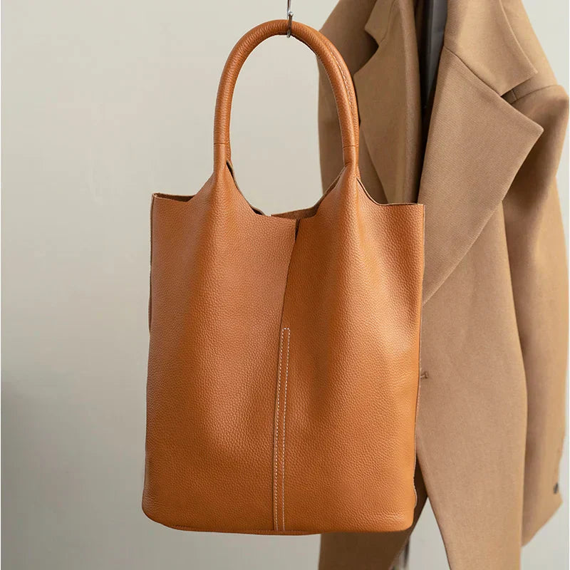 saga | ight blue bucket bag in luxury leather look