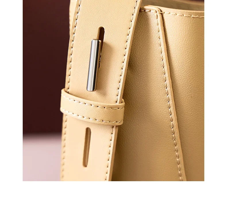 tine |  elegant sand-colored shoulder bag with belt handle