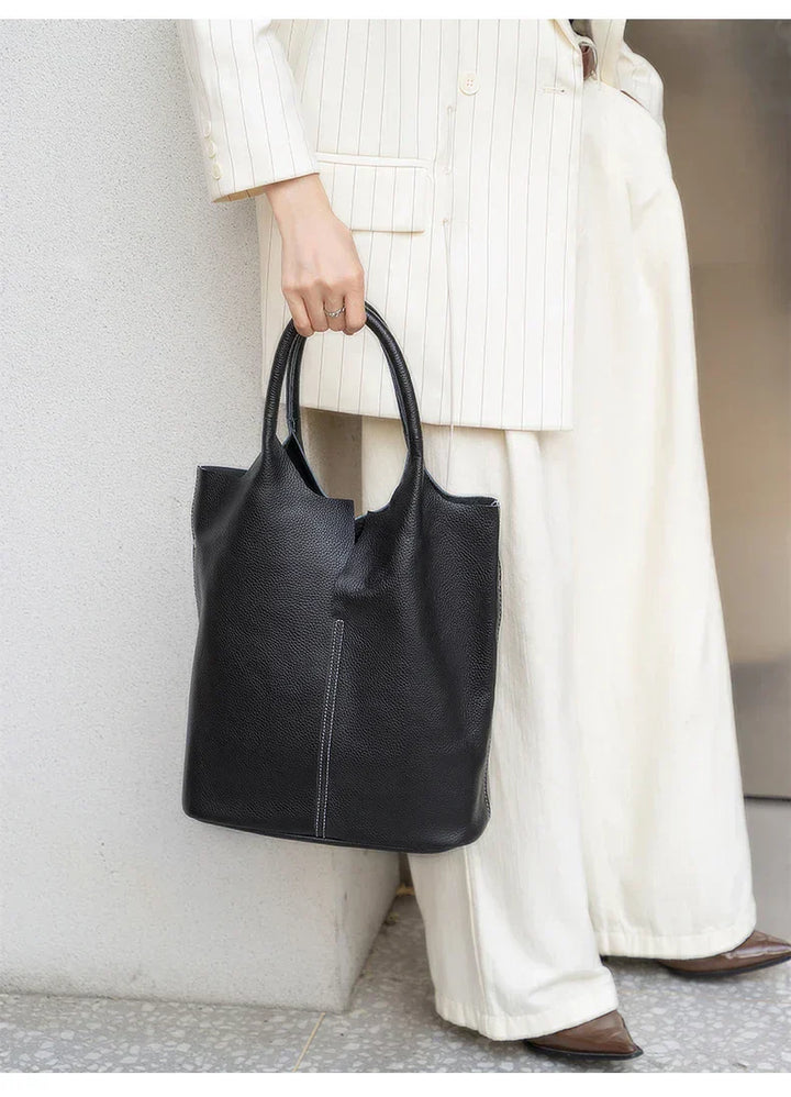 saga | ight blue bucket bag in luxury leather look