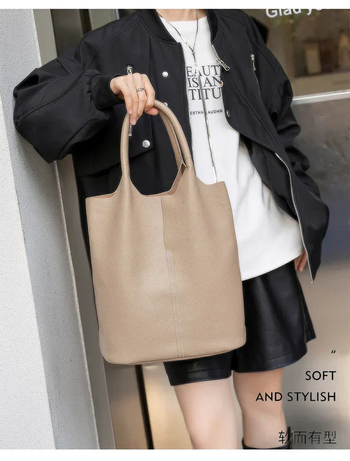 saga | ight blue bucket bag in luxury leather look