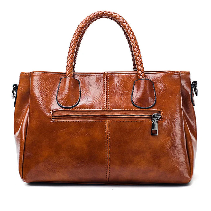 Pia | Elegant leather bag with braided handles