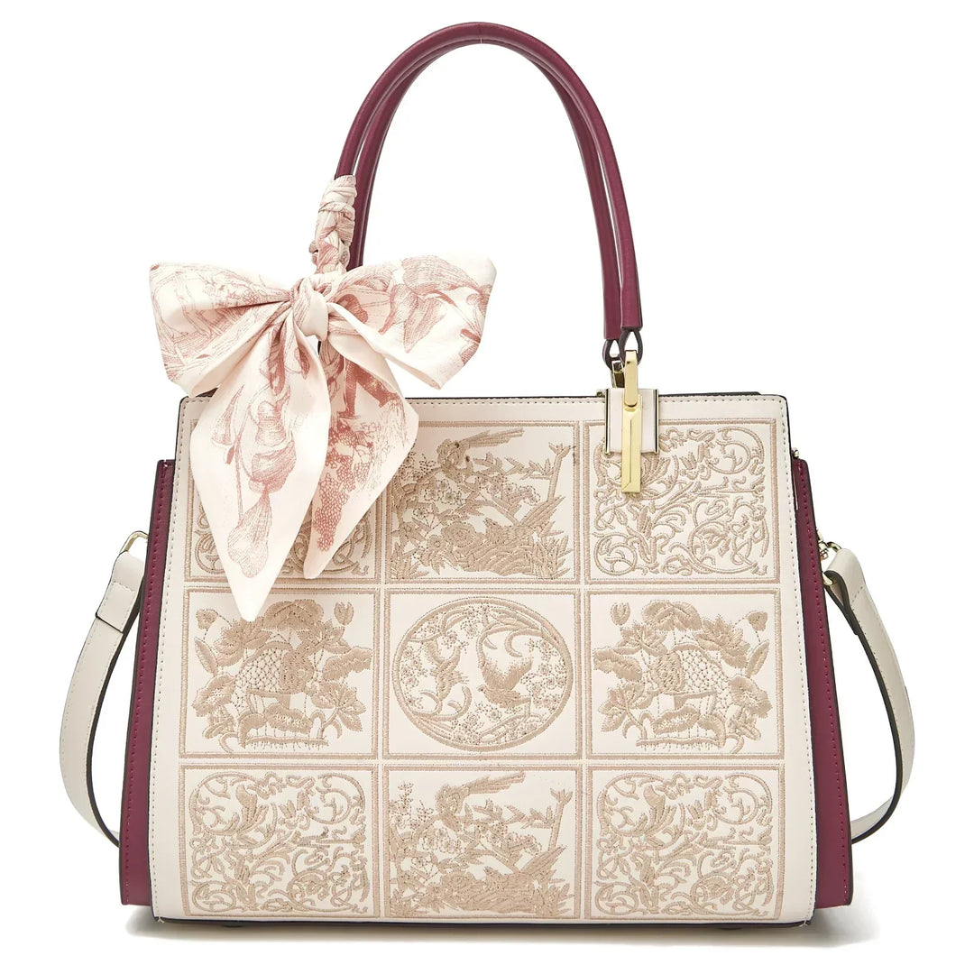 sylvia | unique crossbody with embroidery and bow detail