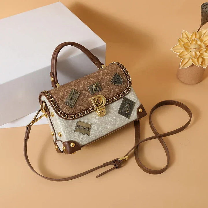 zelda | retro shoulder bag with monogram and gold details