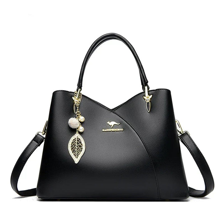 felina | black shoulder bag with elegant pendant