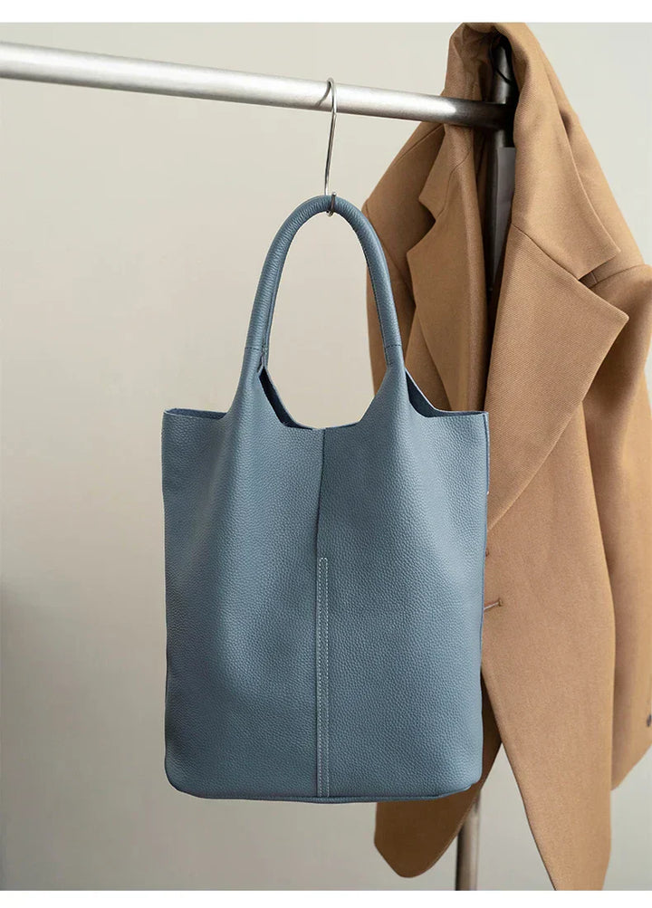 saga | ight blue bucket bag in luxury leather look