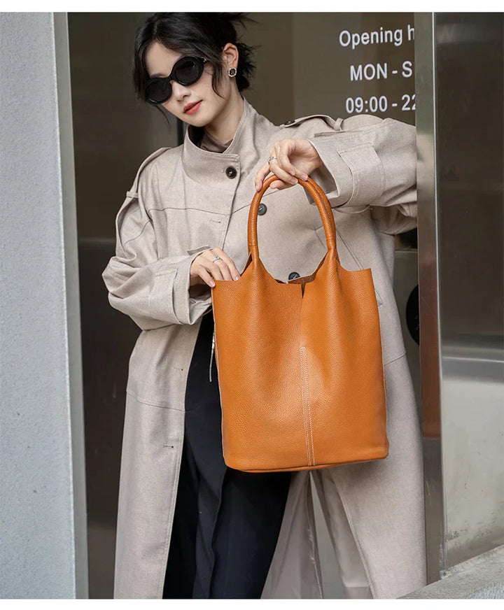 saga | ight blue bucket bag in luxury leather look