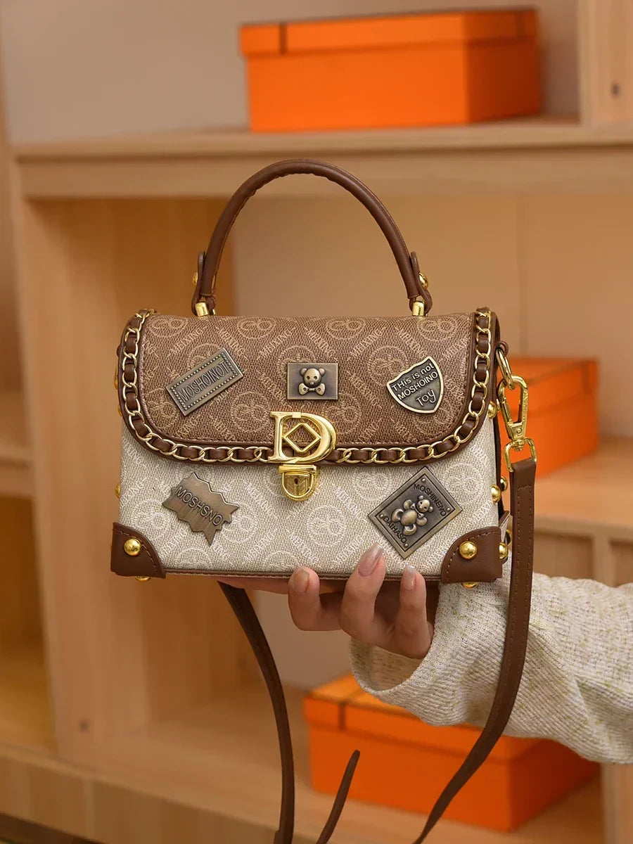 zelda | retro shoulder bag with monogram and gold details