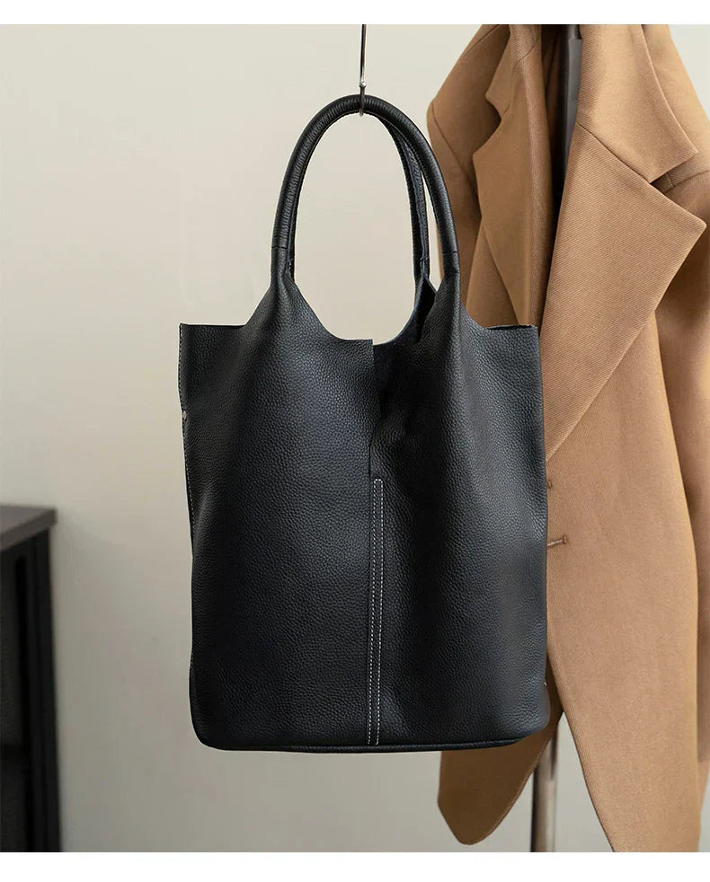 saga | ight blue bucket bag in luxury leather look