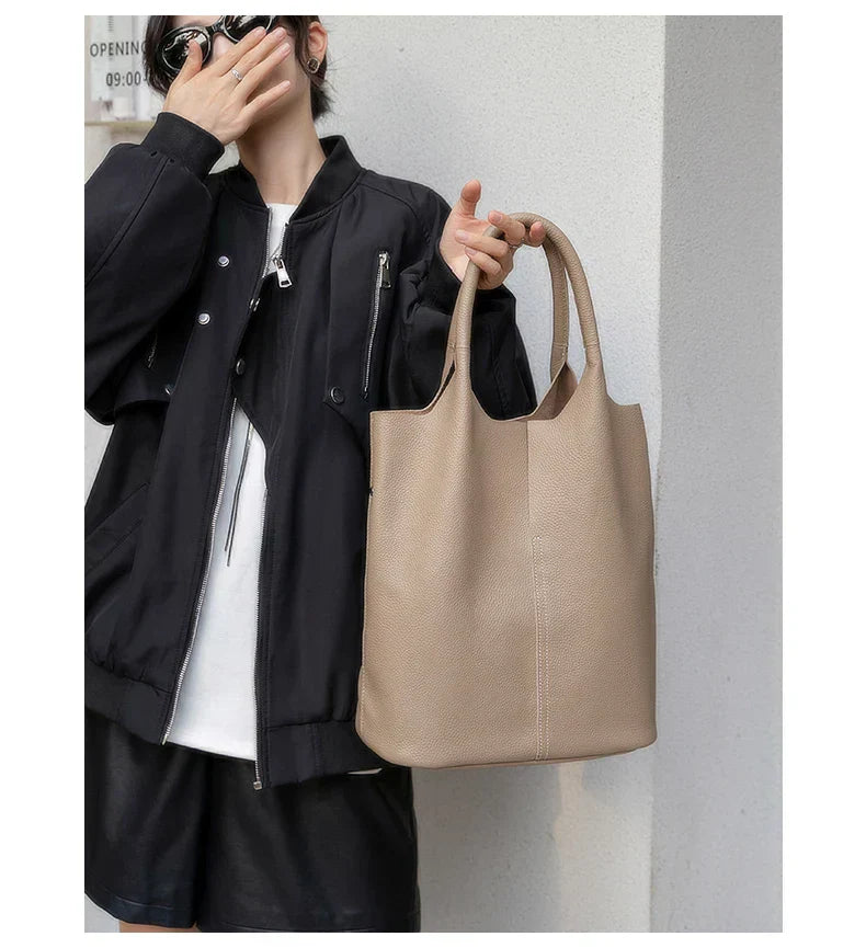 saga | ight blue bucket bag in luxury leather look
