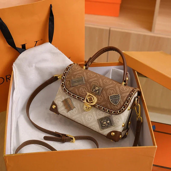 zelda | retro shoulder bag with monogram and gold details