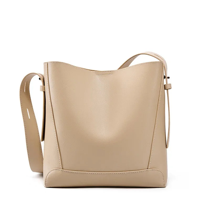 tine |  elegant sand-colored shoulder bag with belt handle