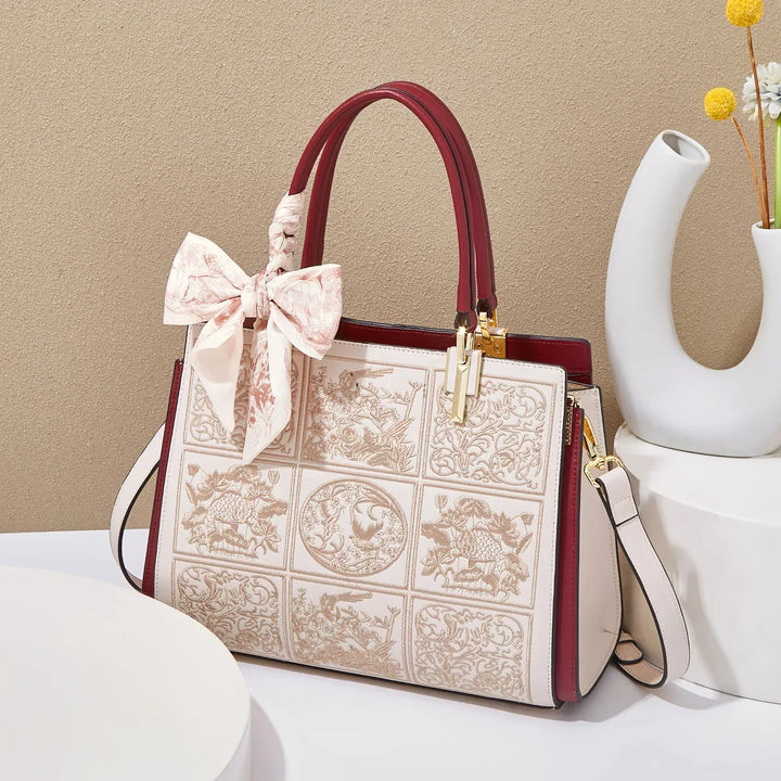 sylvia | unique crossbody with embroidery and bow detail