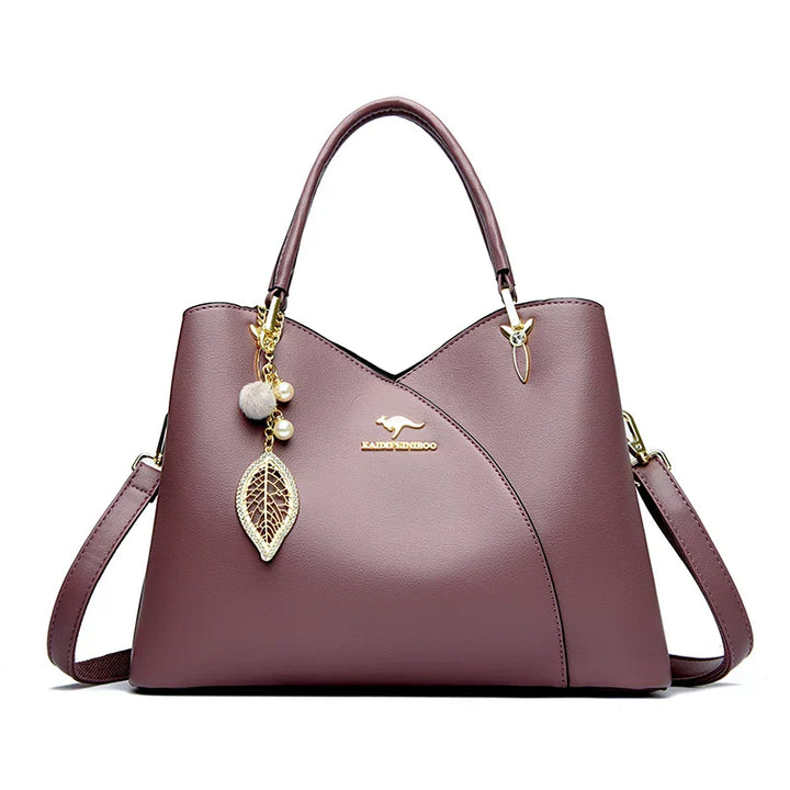 felina | black shoulder bag with elegant pendant