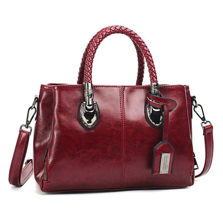 Pia | Elegant leather bag with braided handles