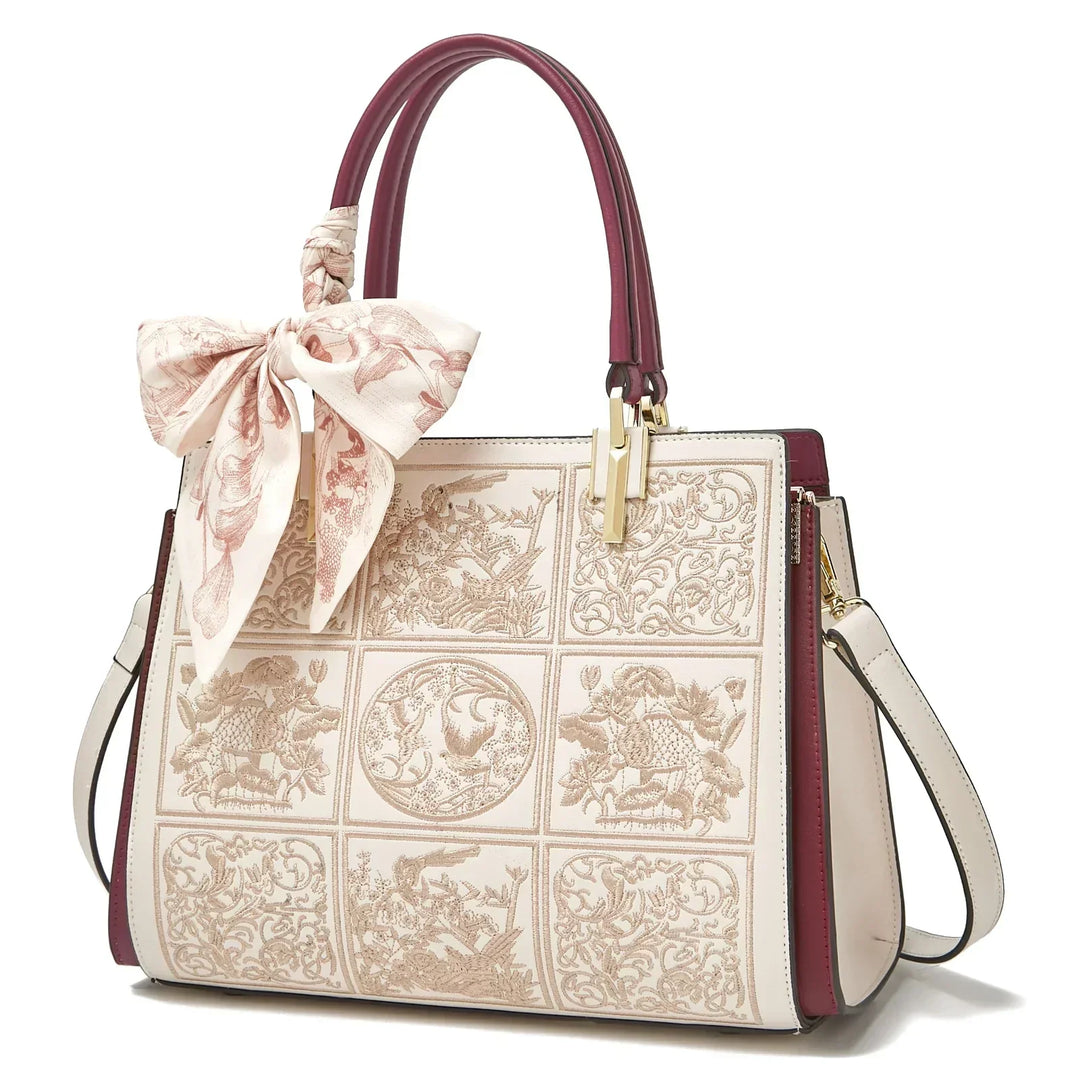 sylvia | unique crossbody with embroidery and bow detail