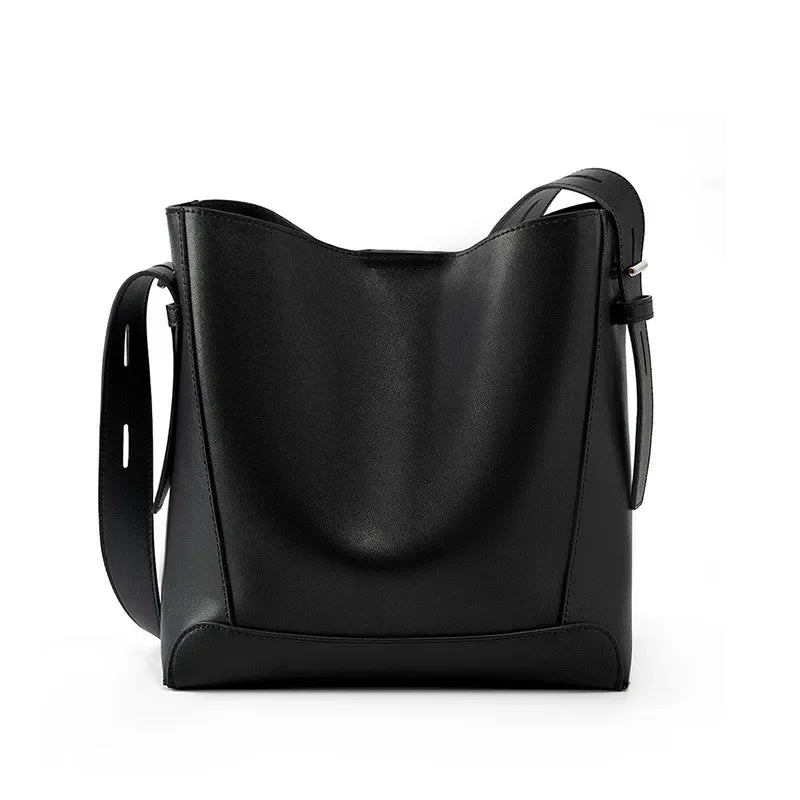 tine |  elegant sand-colored shoulder bag with belt handle