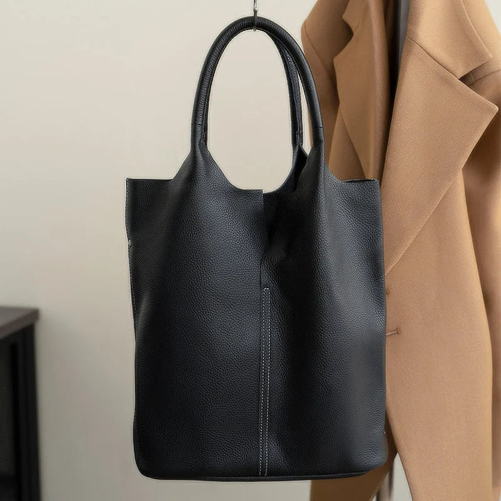 saga | ight blue bucket bag in luxury leather look